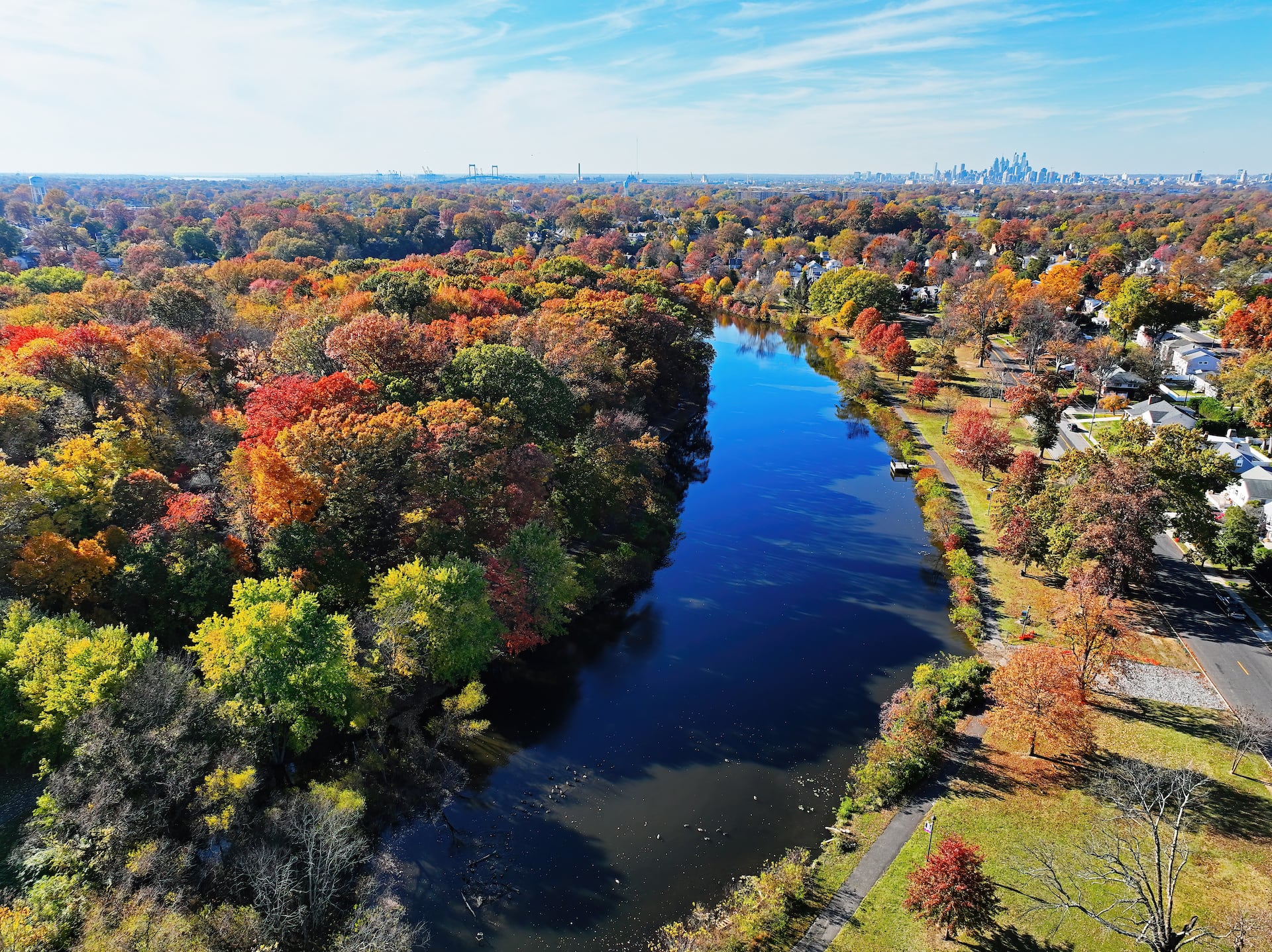 aerial view of autumn trees and river